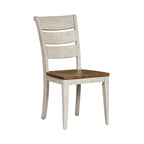 Table de salle à manger avec tréteaux, chaises et banc blanc antique, style ferme revisité