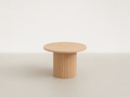 Fluted Base Round Coffee Table with Sculptural Calm Form for Living Room