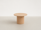 Fluted Base Round Coffee Table with Sculptural Calm Form for Living Room